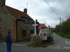 Erecting the new cross at the top of Cross Lane, 26 April 2001