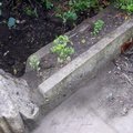 Cut stones, possibly from St Peter’s chapel, in Roddy Rowe's garden, Cross Lane, 2013