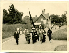 Hospital Sunday procession led by Fakenham Salvation Army band passing the Pit. Loaned BG