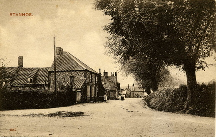 The Street looking west from the corner with Bircham Road and with distant figures. Postcard, c 1920. Loaned JW