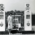 Jean Barber at her petrol pumps, c 1964