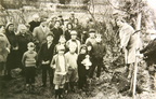 Mrs Winnie Wright planting the second of two willow trees by the Pit to commemorate 50 years of the WI movement, 11 April 1967